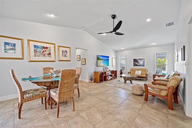 dining room featuring lofted ceiling and ceiling fan