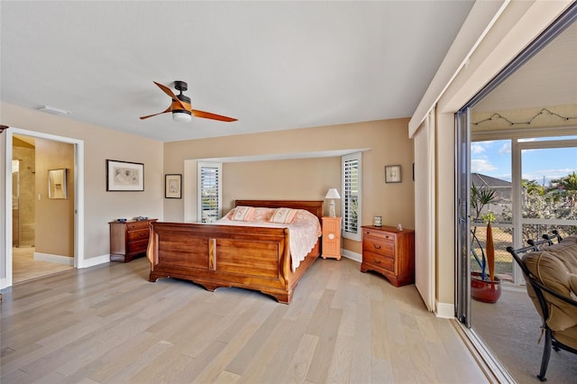 bedroom featuring connected bathroom, access to outside, ceiling fan, and light wood-type flooring