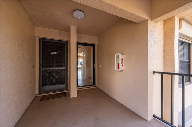 doorway to property with a balcony