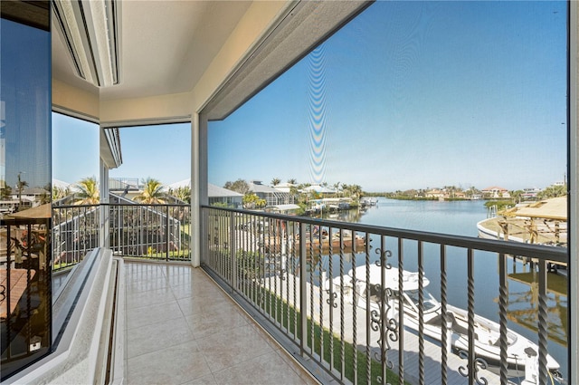 balcony featuring a water view