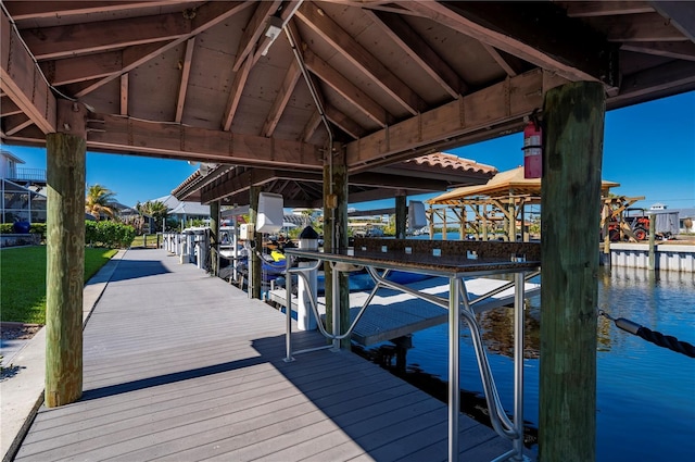 view of dock with a water view