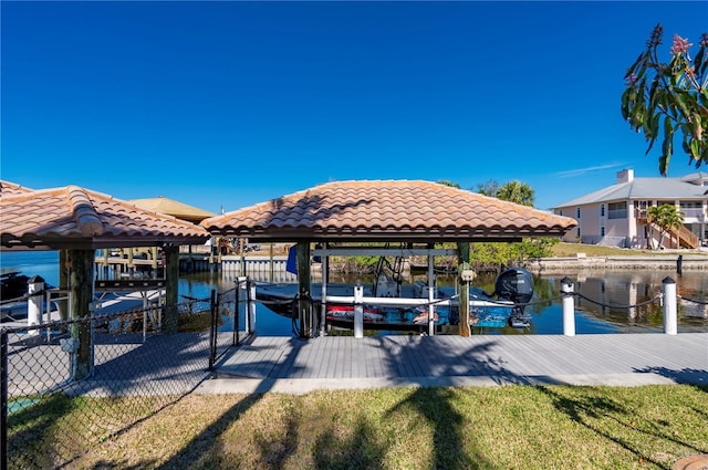 dock area with a water view