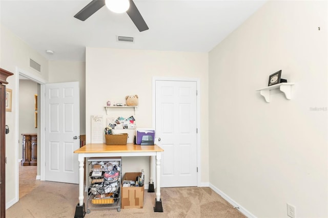 interior space with ceiling fan