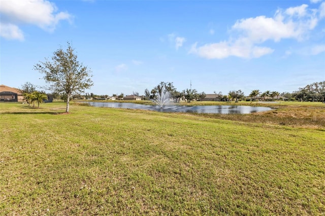 view of yard with a water view