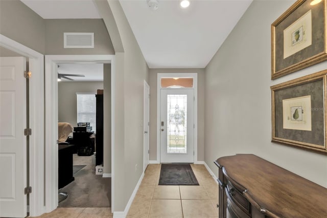 foyer entrance featuring light tile patterned floors