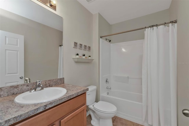 full bathroom with vanity, tile patterned flooring, shower / bath combination with curtain, and toilet