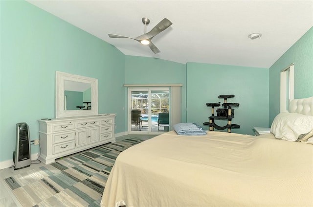 bedroom featuring lofted ceiling, access to exterior, and ceiling fan