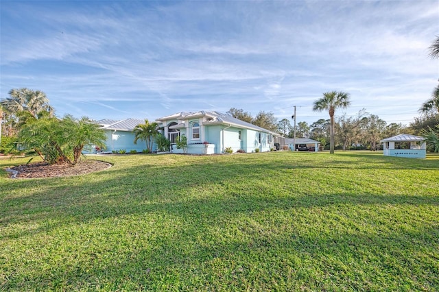 view of yard with an attached garage