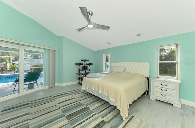 bedroom featuring ceiling fan, vaulted ceiling, light hardwood / wood-style flooring, and access to outside