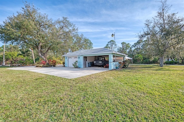 garage with a yard