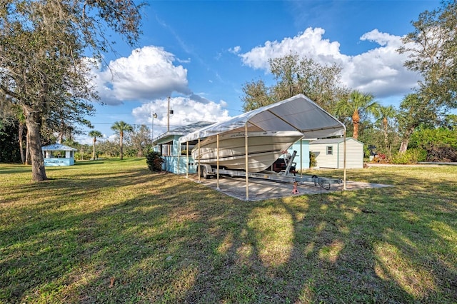 exterior space featuring a carport and a shed