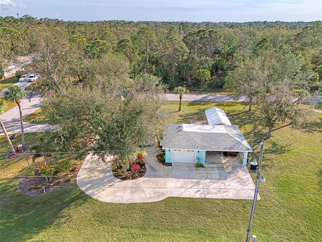 bird's eye view with a forest view