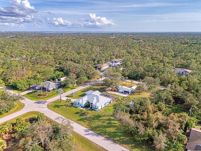 drone / aerial view with a forest view