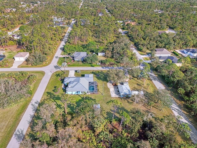 bird's eye view featuring a view of trees