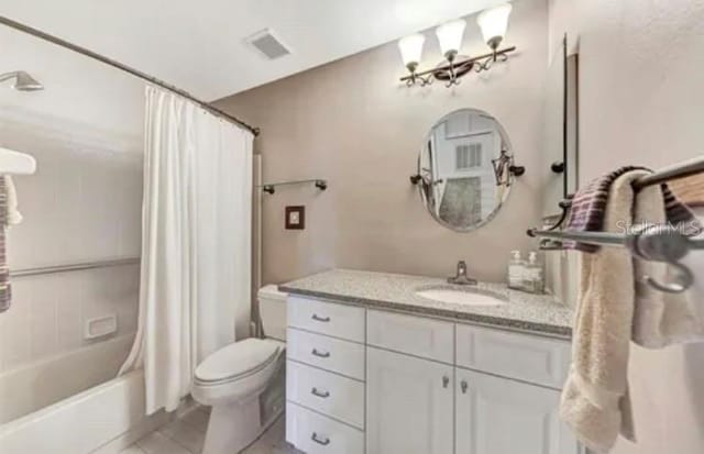 full bathroom with vanity, shower / bath combination with curtain, and toilet