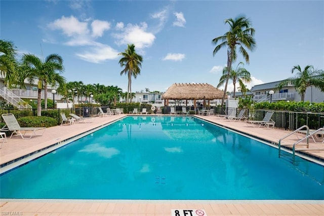 view of swimming pool featuring a gazebo and a patio