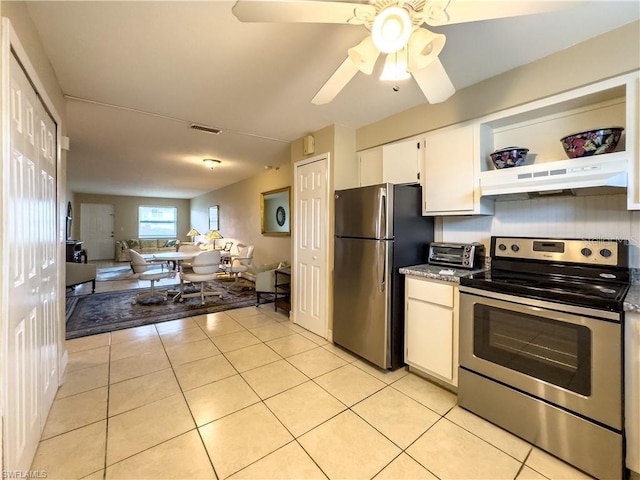 kitchen featuring light tile patterned flooring, ceiling fan, stainless steel appliances, and white cabinets