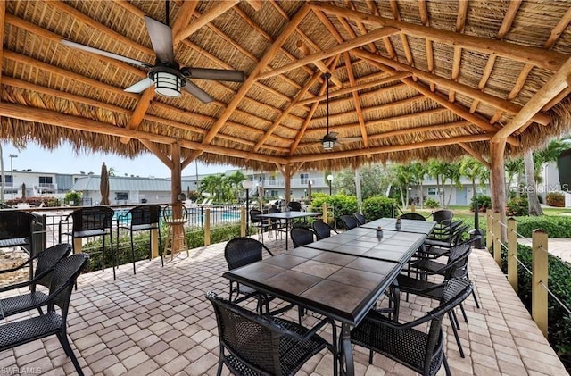 view of patio with a gazebo and ceiling fan