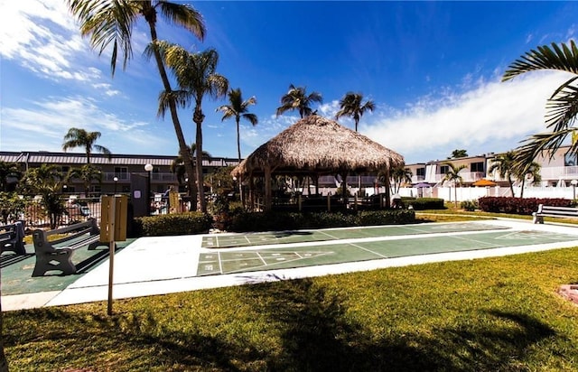 view of community featuring a yard and a gazebo