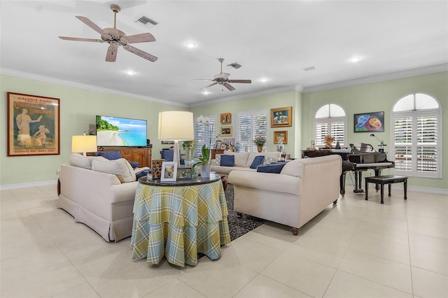 living room with light tile patterned floors, crown molding, and ceiling fan