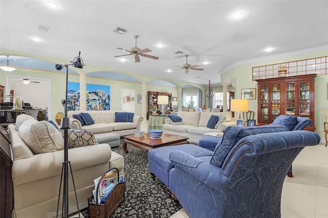 living room featuring ornate columns, ornamental molding, lofted ceiling, and ceiling fan