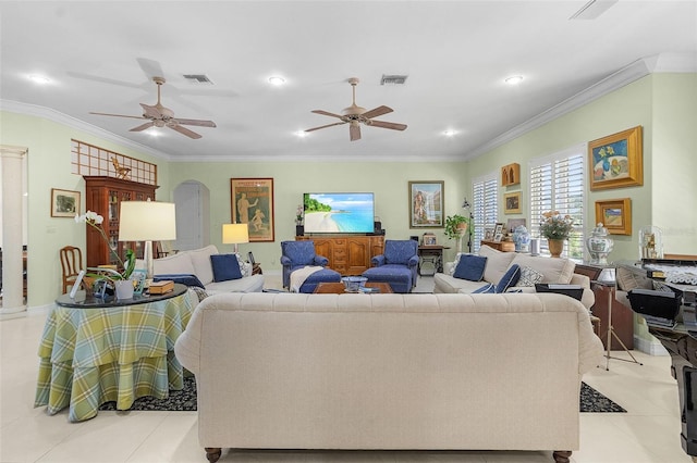 living room with light tile patterned flooring, ceiling fan, and ornamental molding