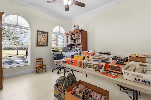 office area with crown molding, ceiling fan, and tile patterned flooring