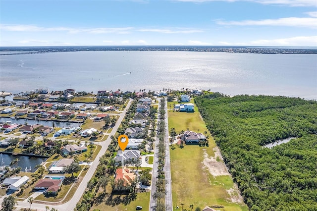 drone / aerial view featuring a water view