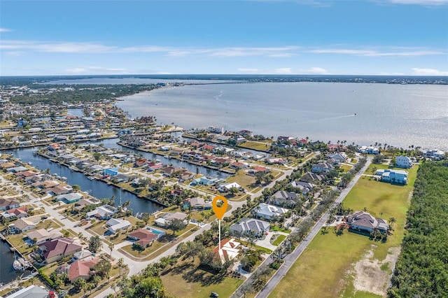 bird's eye view with a water view