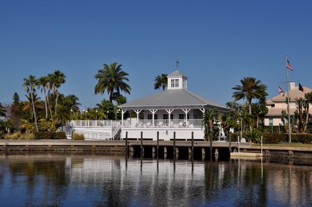 dock area featuring a gazebo and a water view