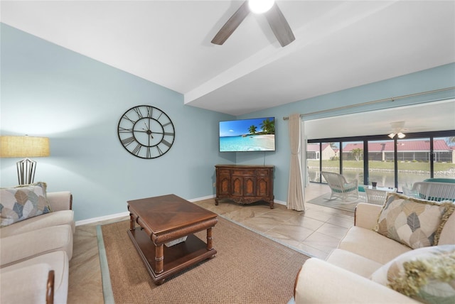 tiled living room featuring vaulted ceiling and ceiling fan