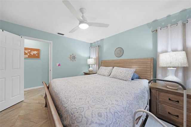 bedroom featuring ceiling fan