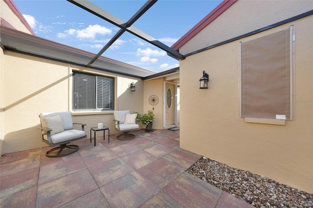 view of patio / terrace with a lanai