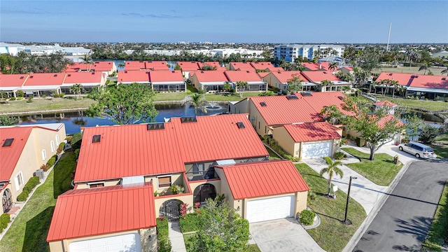 drone / aerial view featuring a water view