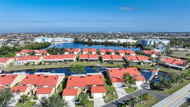 bird's eye view with a water view