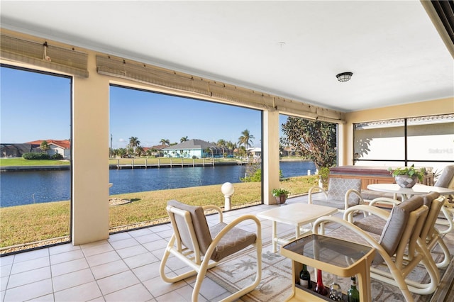 sunroom with a water view