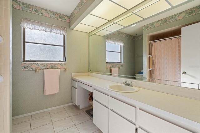 bathroom featuring vanity, tile patterned floors, and a shower with shower curtain