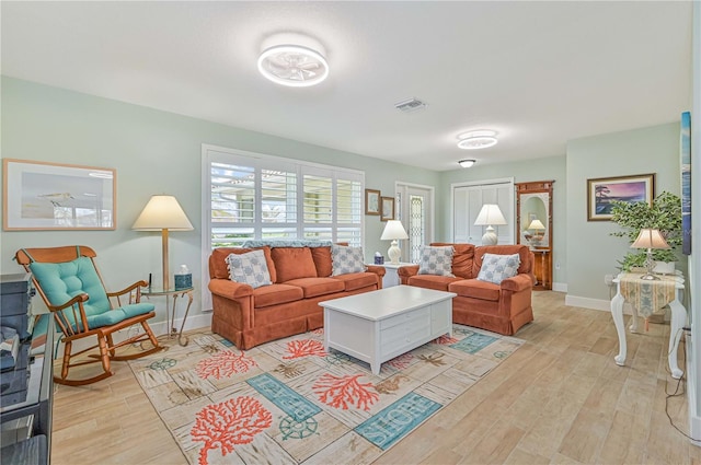 living room featuring light wood-type flooring