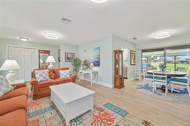 living room featuring light wood-type flooring