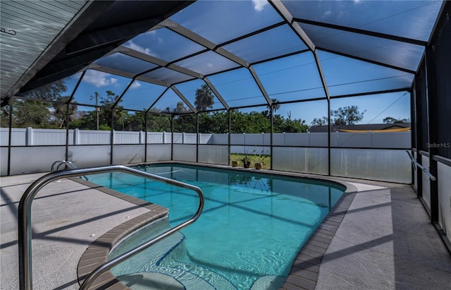 view of pool with a lanai and a patio area