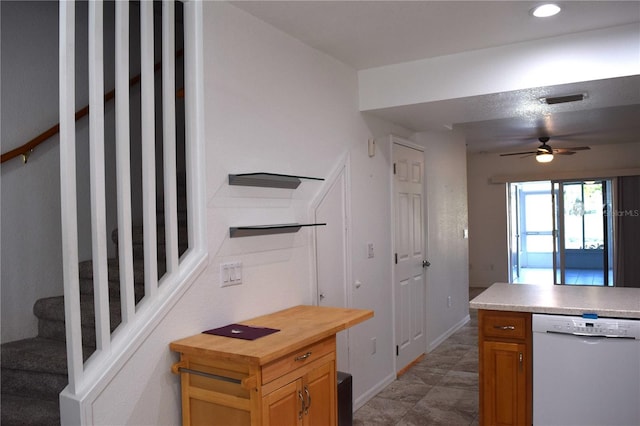 kitchen featuring ceiling fan and white dishwasher