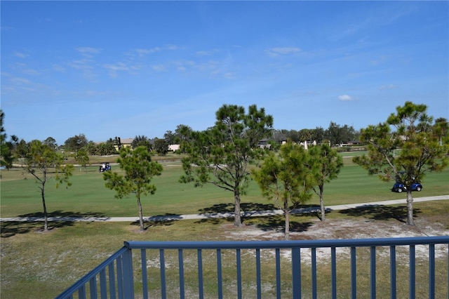 view of yard featuring a balcony