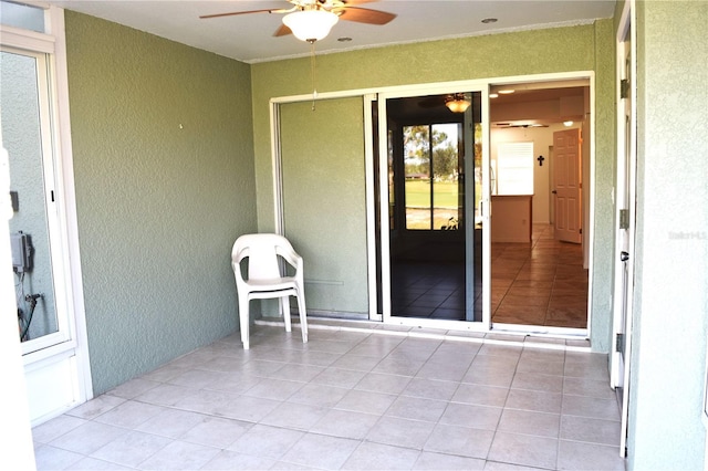 view of patio / terrace featuring ceiling fan