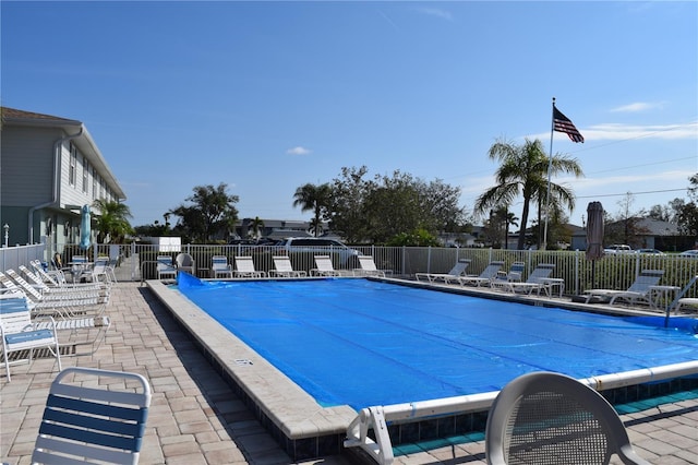 view of pool featuring a patio area