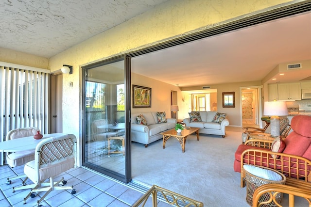 living room with light colored carpet