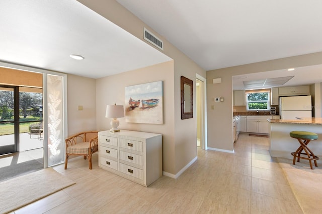 interior space featuring light tile patterned floors