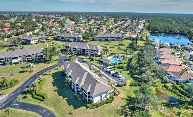 bird's eye view with a water view