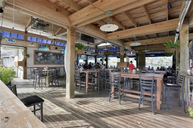 deck with a gazebo and an outdoor bar