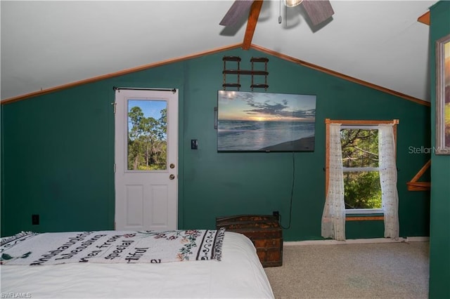 carpeted bedroom featuring vaulted ceiling and ceiling fan