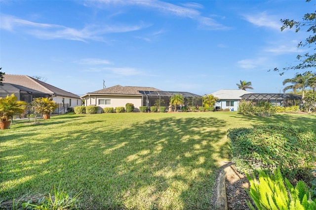 view of yard with a lanai